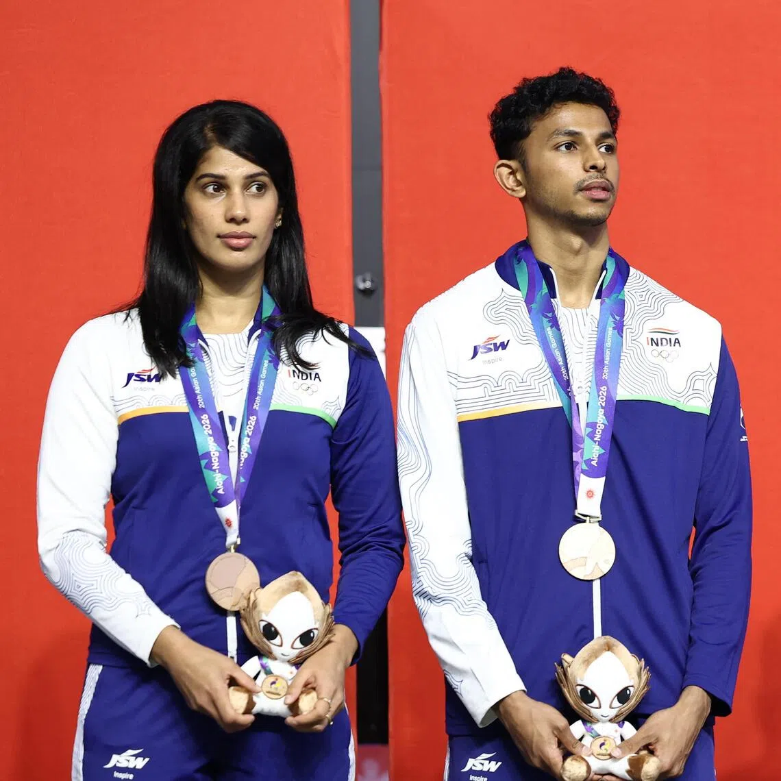 India’s Joshna Chinappa (left) and Velavan Senthilkumar on the podium with fellow Asian Games squash mixed doubles bronze medallists Ameeshenraj Chandaran and Rachel Mae Arnold of Malaysia on Sept 27.
