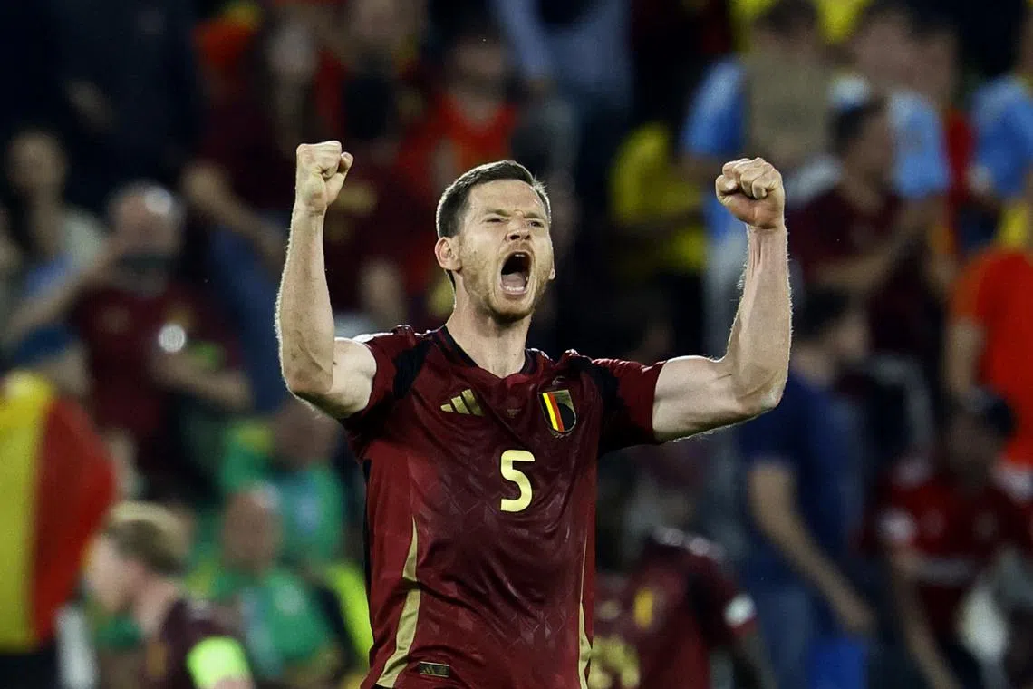 FILE PHOTO: Soccer Football - Euro 2024 - Group E - Belgium v Romania - Cologne Stadium, Cologne, Germany - June 22, 2024 Belgium's Jan Vertonghen celebrates after Kevin De Bruyne scores their second goal REUTERS/Wolfgang Rattay/File Photo