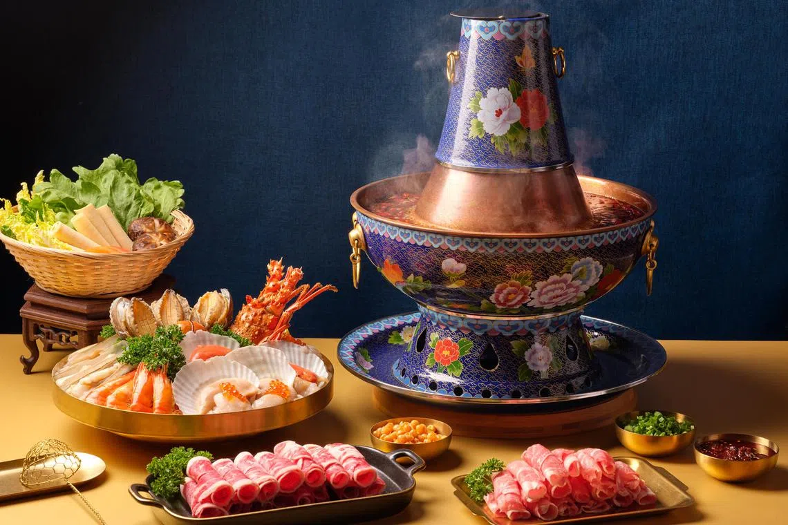 The new hotpot set at Si Chuan Dou Hua at Parkroyal on Beach Road is cooked in a charcoal pot.