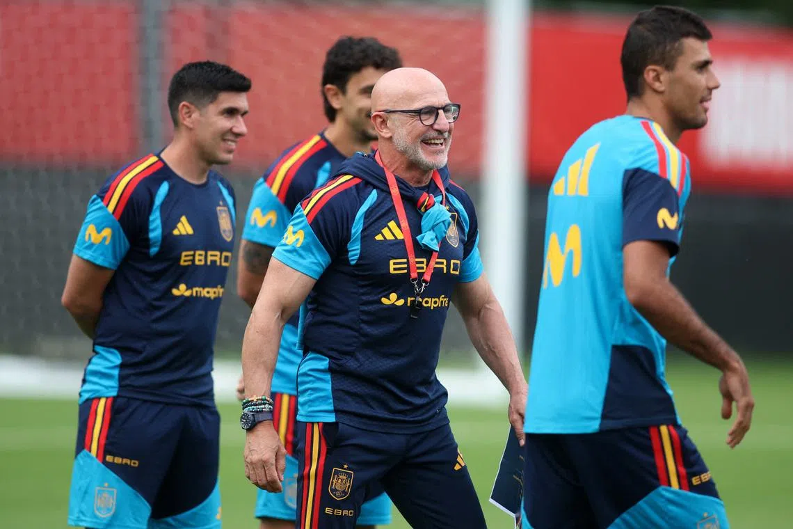 Spain coach Luis De La Fuente and midfielder Rodri (right) during training at Baylor School in Chattanooga, Tennessee, on June 22.