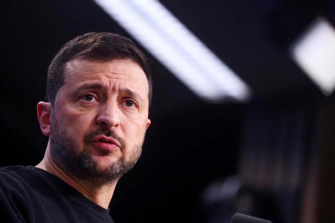 FILE PHOTO: Ukraine's President Volodymyr Zelenskiy attends a press conference during a European Union leaders summit in Brussels, Belgium October 17, 2024. REUTERS/Johanna Geron/File Photo