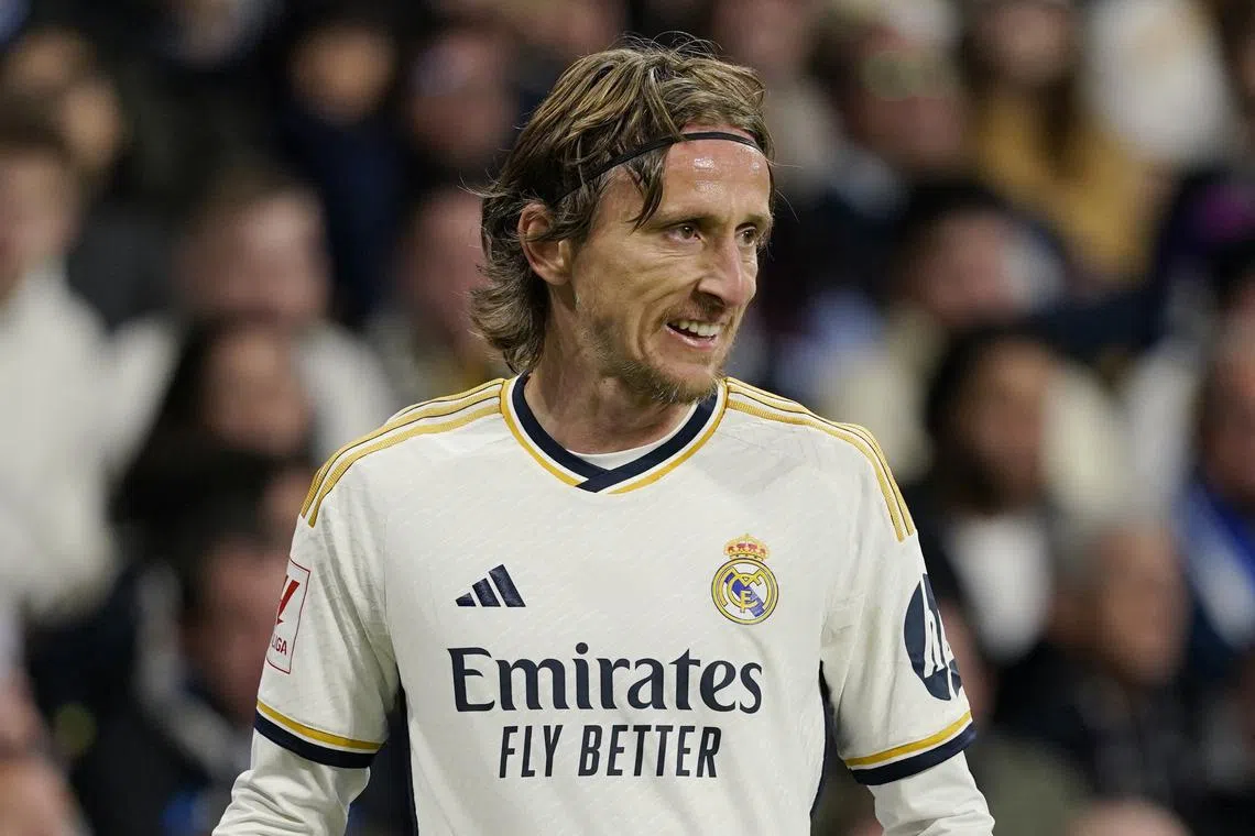 FILE PHOTO: Soccer Football - LaLiga - Real Madrid v Celta Vigo - Santiago Bernabeu, Madrid, Spain - March 10, 2024 Real Madrid's Luka Modric reacts REUTERS/Ana Beltran/File Photo
