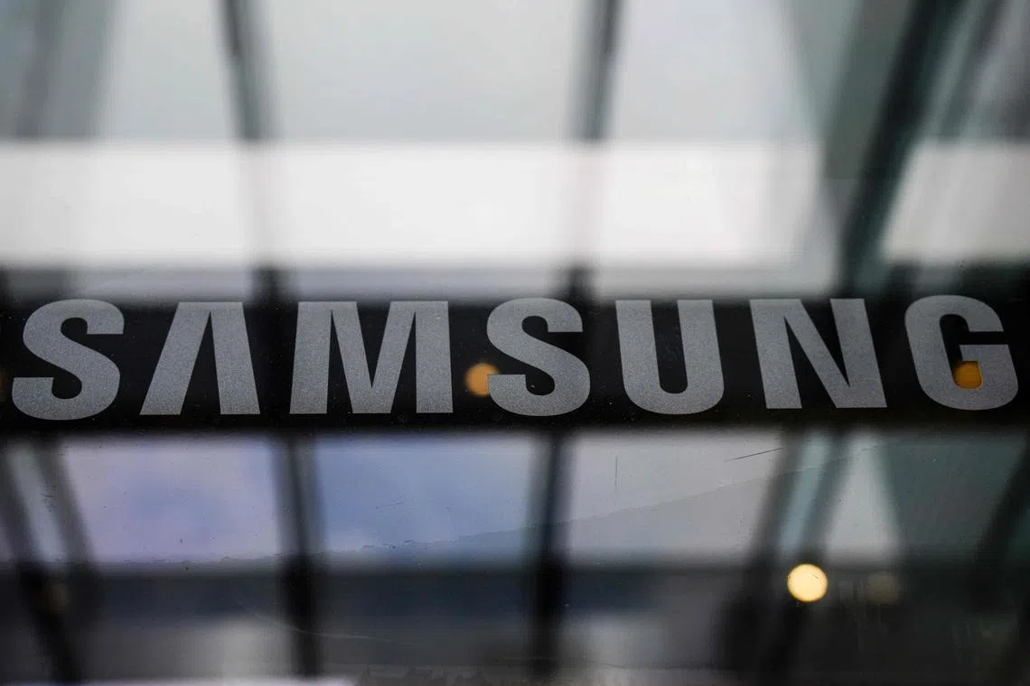 The Samsung logo is displayed at the company's Seocho building in Seoul on July 31, 2024. Samsung Electronics said on July 31 that its operating profits soared some fifteen-fold to $7.5 billion for the second quarter, as chip prices bounce back and demand for generative AI continues to grow. (Photo by ANTHONY WALLACE / AFP)