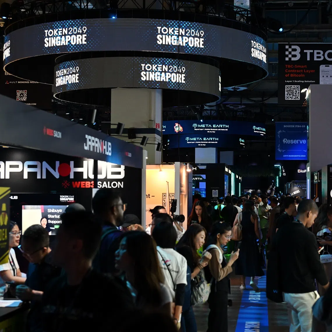 People attending the crypto event, Token2049, Singapore’s largest crypto conference, at the Marina Bay Sands Expo & Convention Centre, on Oct 1.