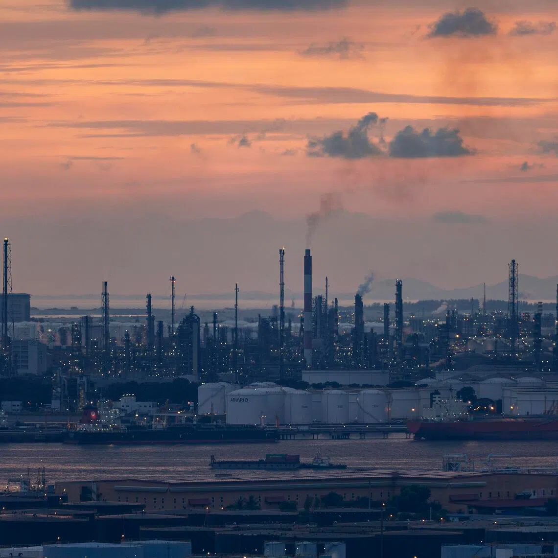 A carbon tax incentivises large emitters to switch to cleaner energy, improve efficiency or adopt low-carbon technologies by making fossil fuel use costlier.