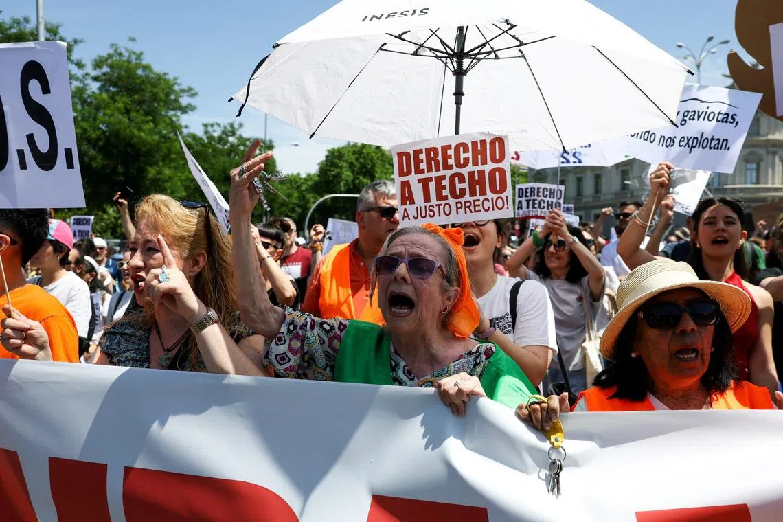 Protesters march in Madrid over soaring housing costs