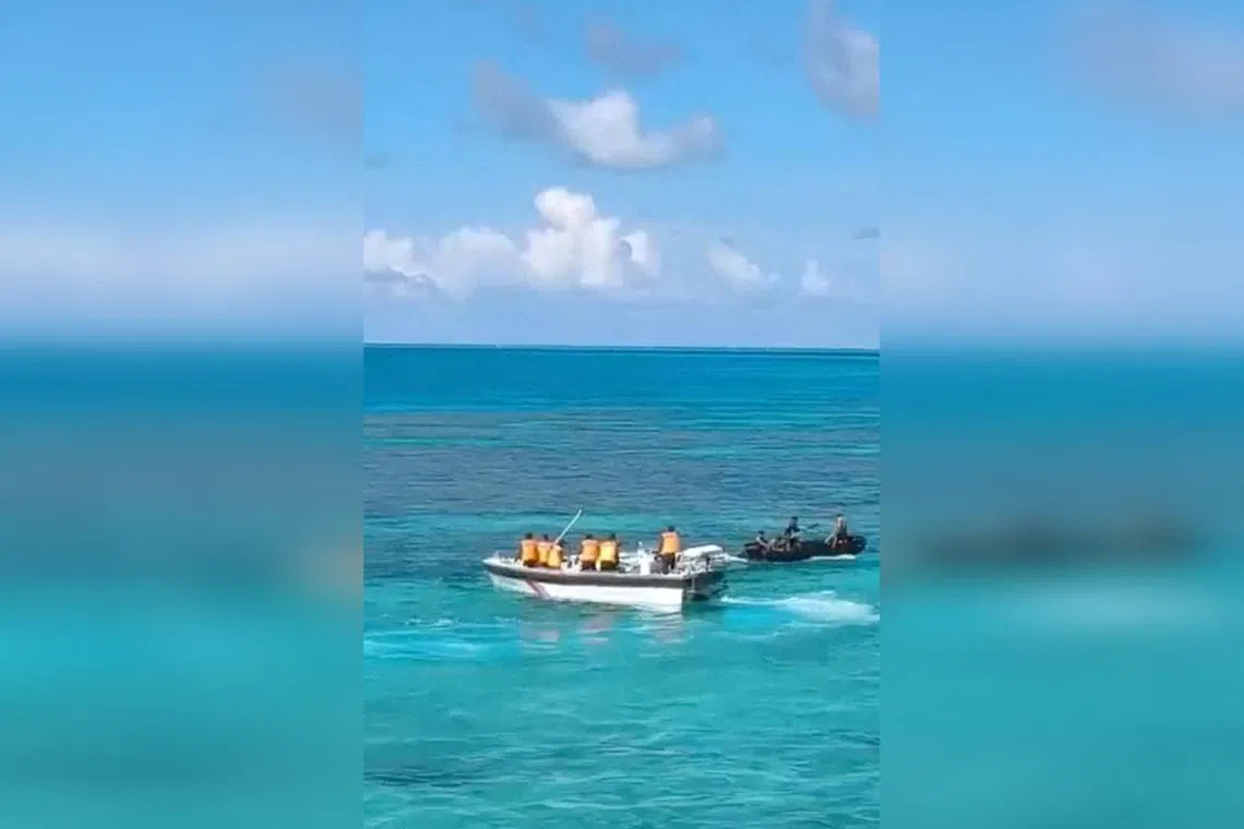 China coast guard reports third clash with Philippines this week