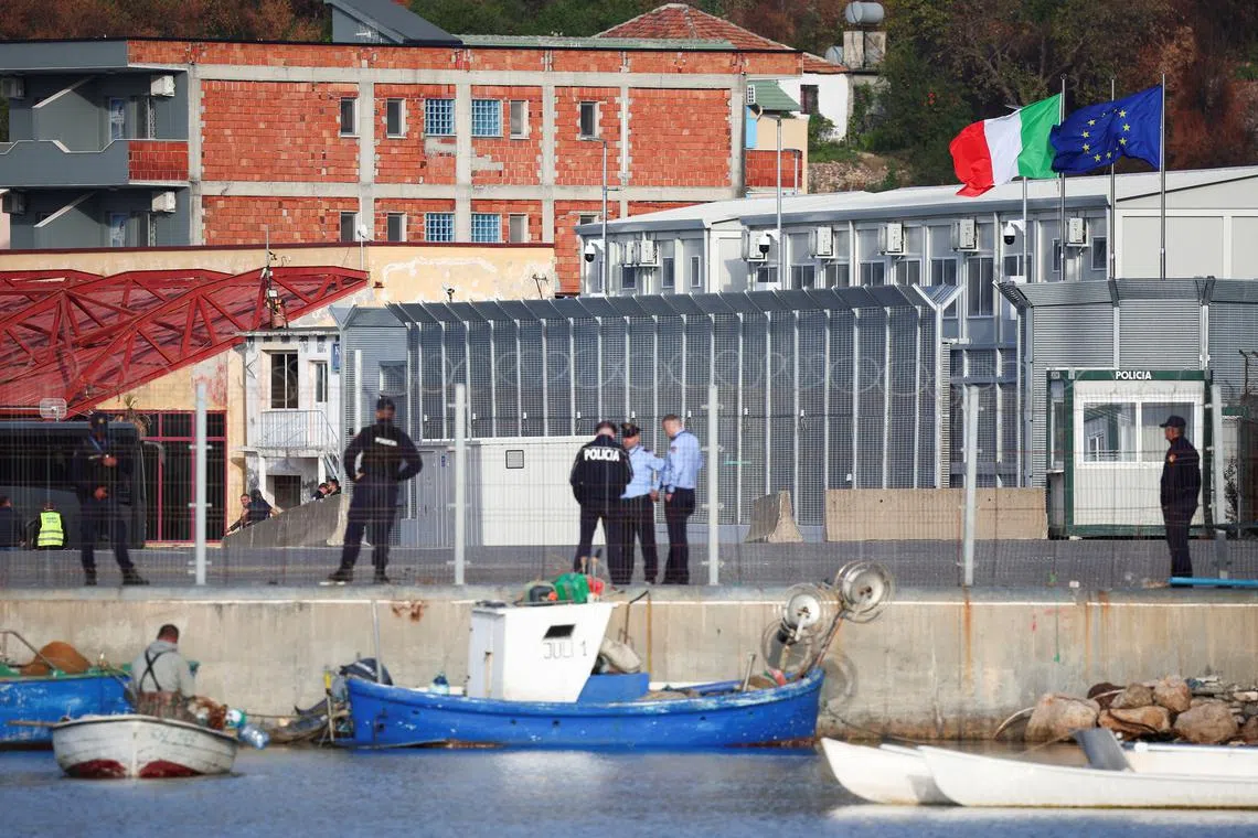FILE PHOTO: A general view of the reception camp, as migrants who were intercepted at sea and later detained at a reception facility in Albania are transferred to Italy after a court in Rome overturned their detention orders, in Shengjin, Albania, October 19, 2024. REUTERS/Florion Goga/File Photo