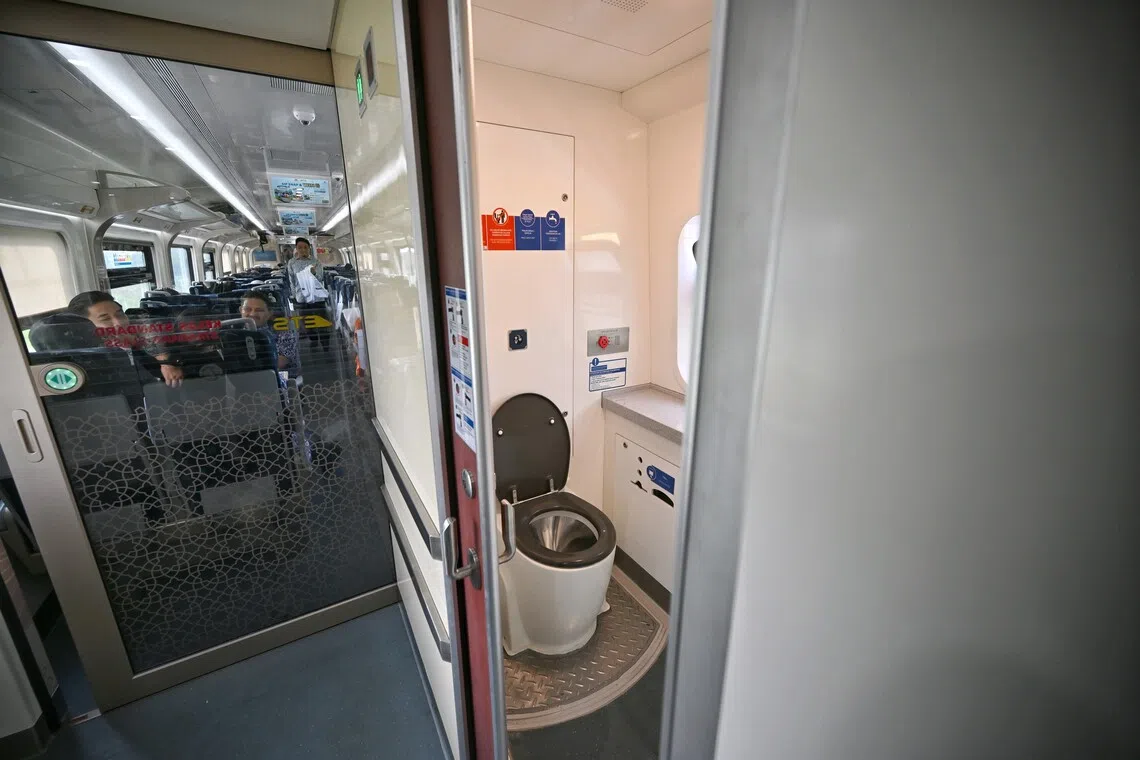 There are four toilets available on board the KL-JB ETS train.