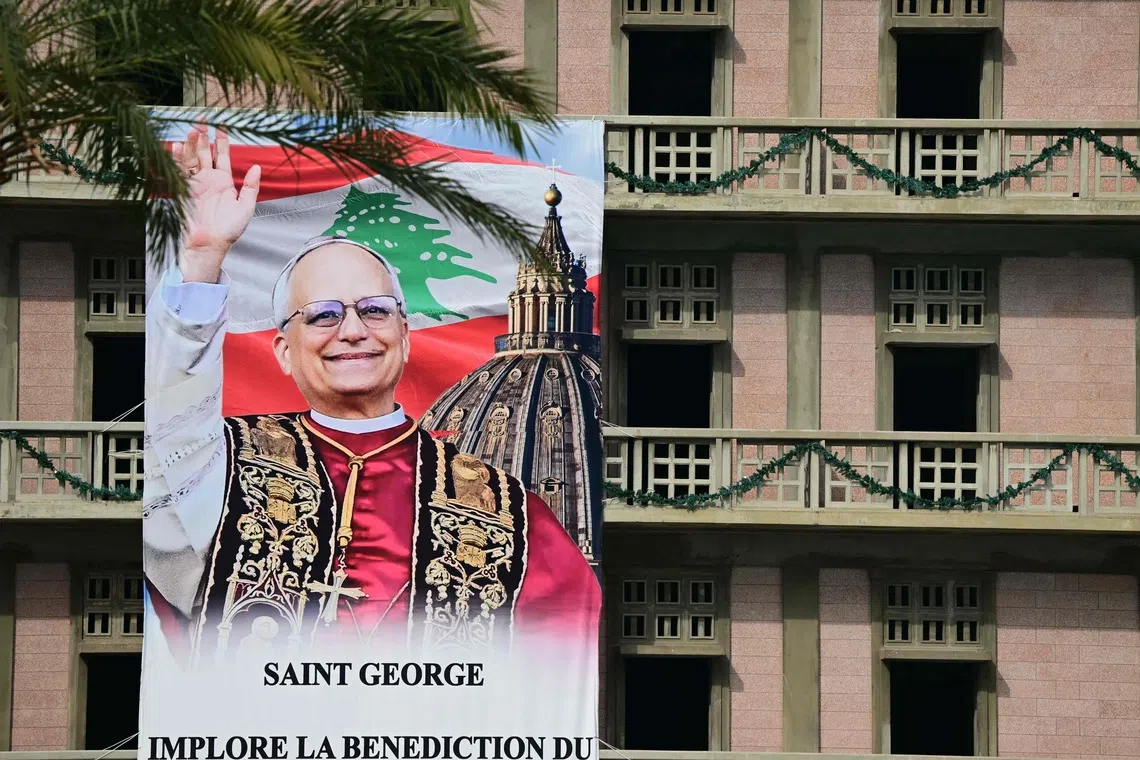 A banner depicting Pope Leo XIV hanging from a building in Beirut on Nov 29, ahead of his visit to Lebanon.