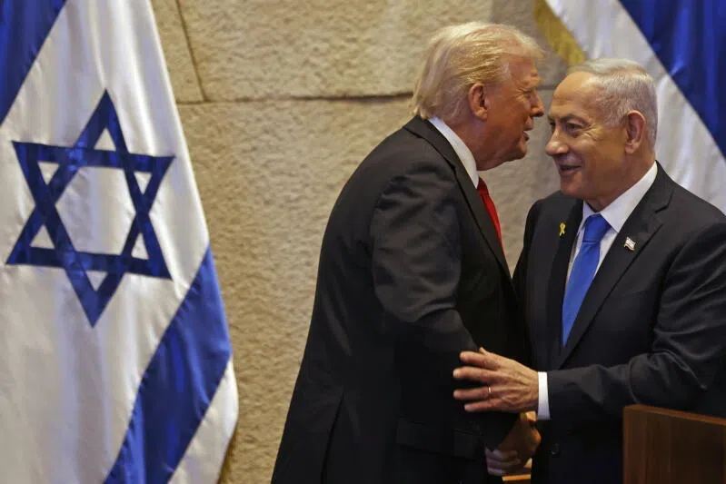 US President Donald Trump (left) speaking with Israel's Prime Minister Benjamin Netanyahu at the Israeli Parliament in Jerusalem, Israel, on Oct 13.