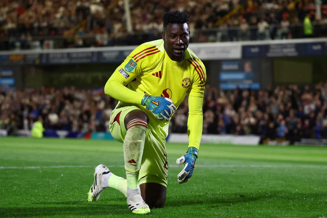 Soccer Football - Carabao Cup - Second Round - Grimsby Town v Manchester United - Blundell Park, Grimsby, Britain - August 27, 2025 Manchester United's Andre Onana during the penalty shoot-out Action Images via Reuters/Lee Smith