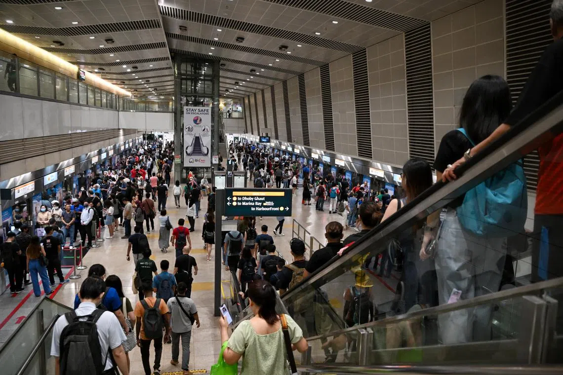 Generic pix of commuters during the morning peak hour traffic at the Bishan MRT station on Aug 17, 2023.
