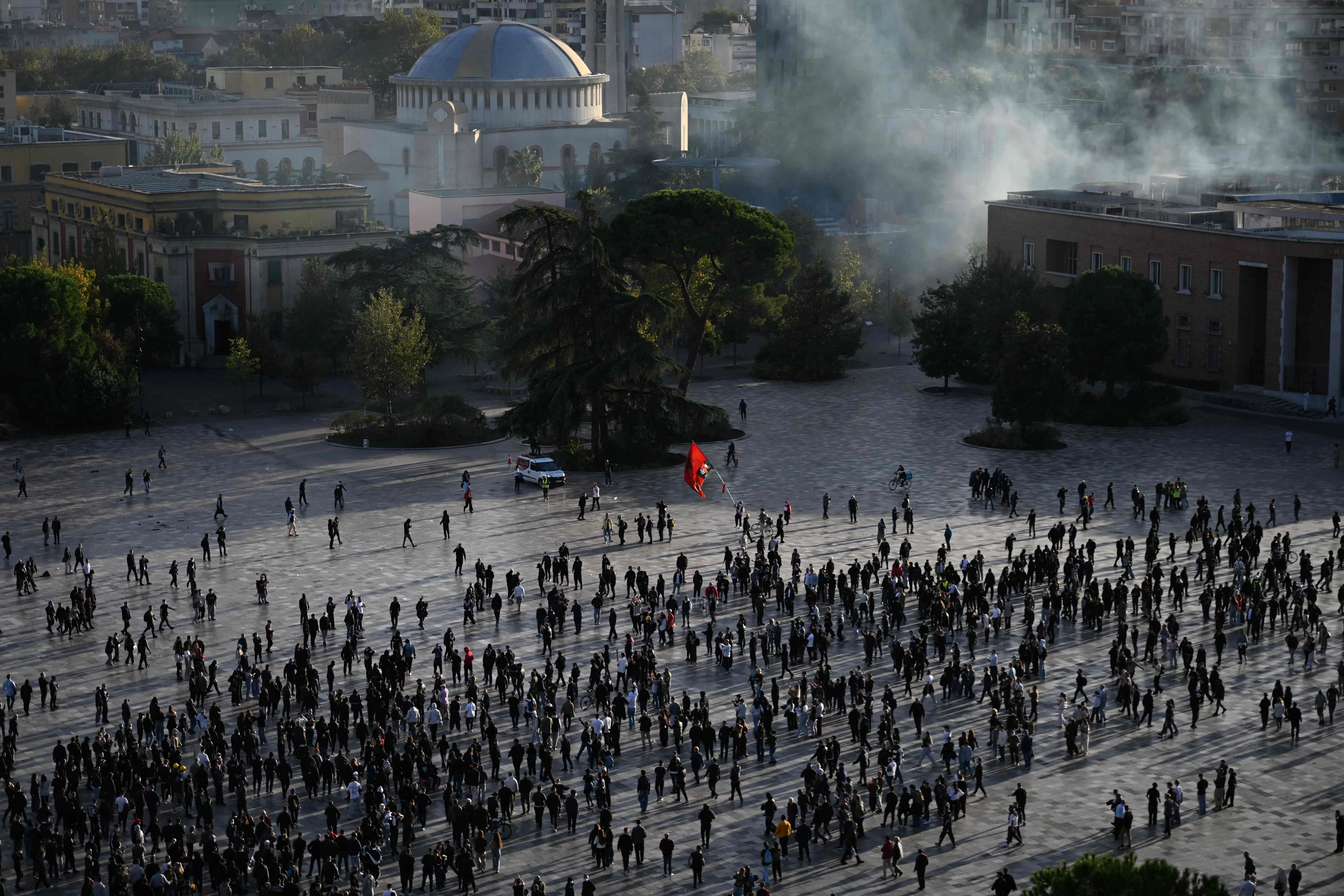 Protesters threw rocks at officers at an anti-government demonstration in central Tirana on Oct 24.