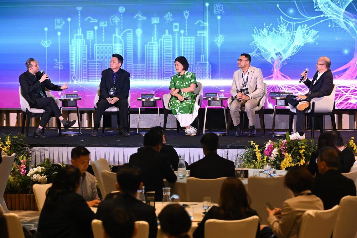 (From left) SkillsFuture Singapore chief executive Tan Kok Yam, Cragar Industries managing director Joseph Wong, Grab chief people officer Ong Chin Yin and Boston Consulting Group managing director and partner Sagar Goel at a panel moderated by ST associate editor for newsroom strategy Jeremy Au Yong on July 7.