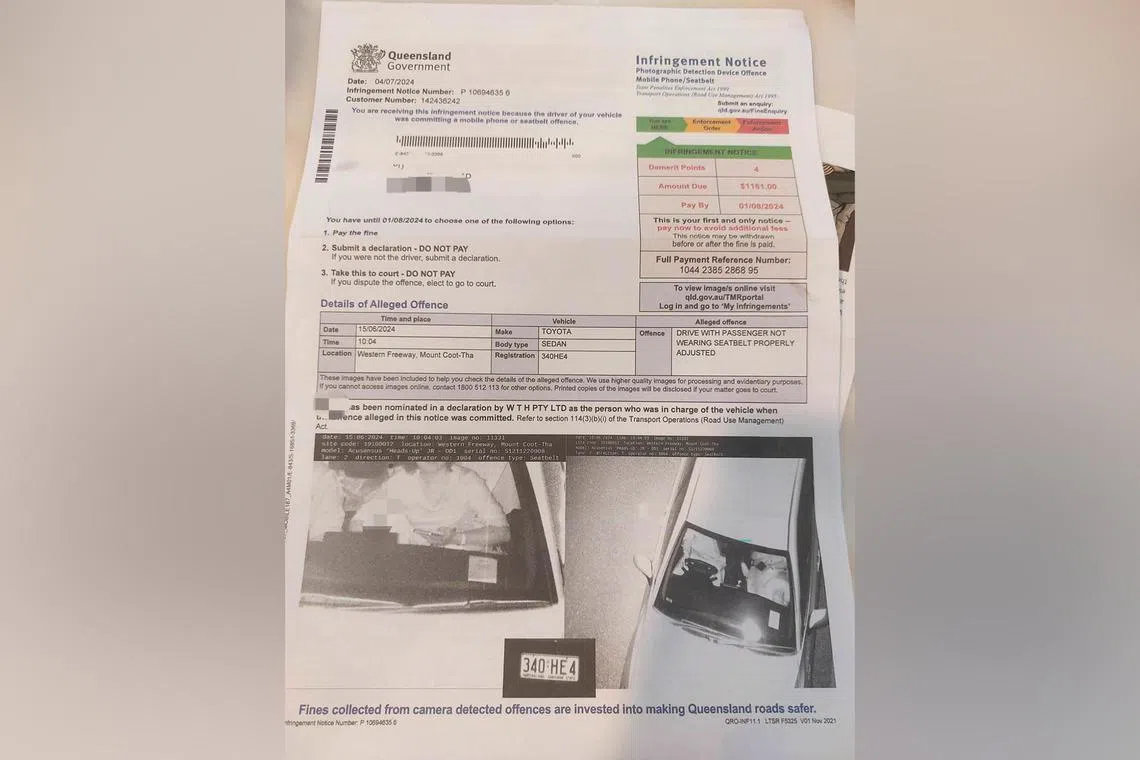In the fine notice issued by the Queensland government, photo evidence of her wearing a seat belt improperly was captured by traffic cameras.