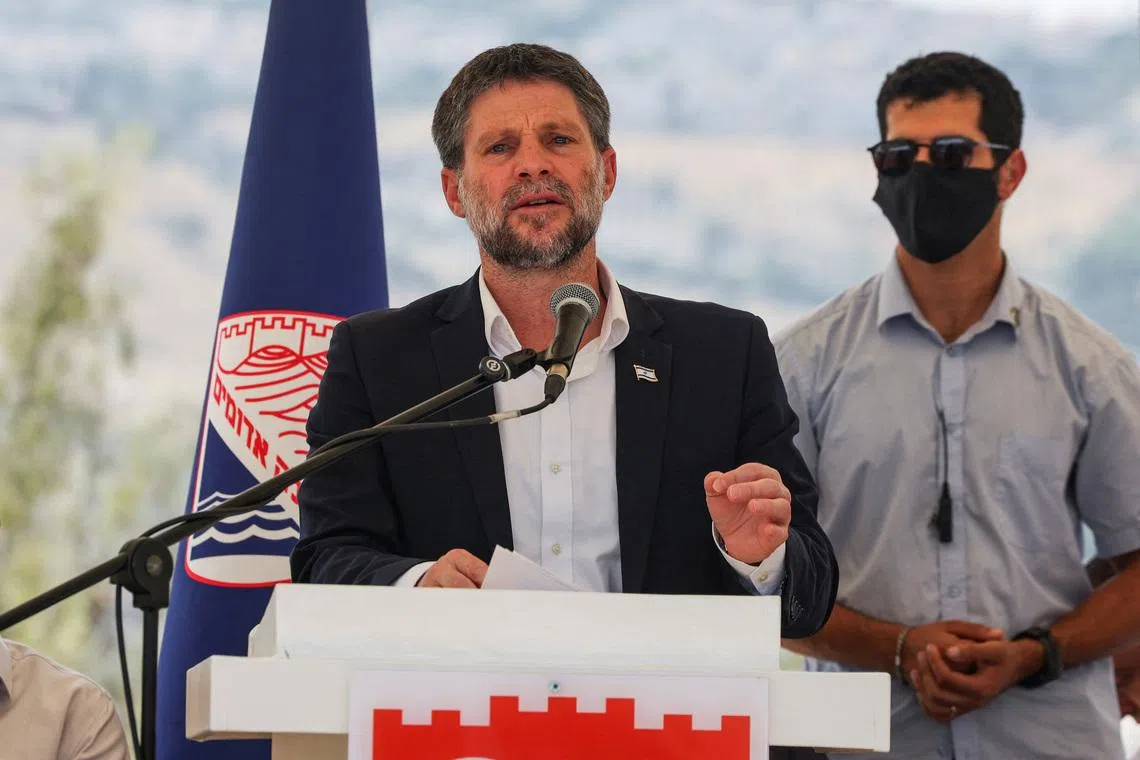 Israeli Finance Minister Bezalel Smotrich speaks at a press conference regarding settlements expansion for the long-frozen E1 settlement, that would split East Jerusalem from the occupied West Bank, near the Israeli settlement of Maale Adumim in the Israeli-occupied West Bank, August 14, 2025. REUTERS/Ronen Zvulun