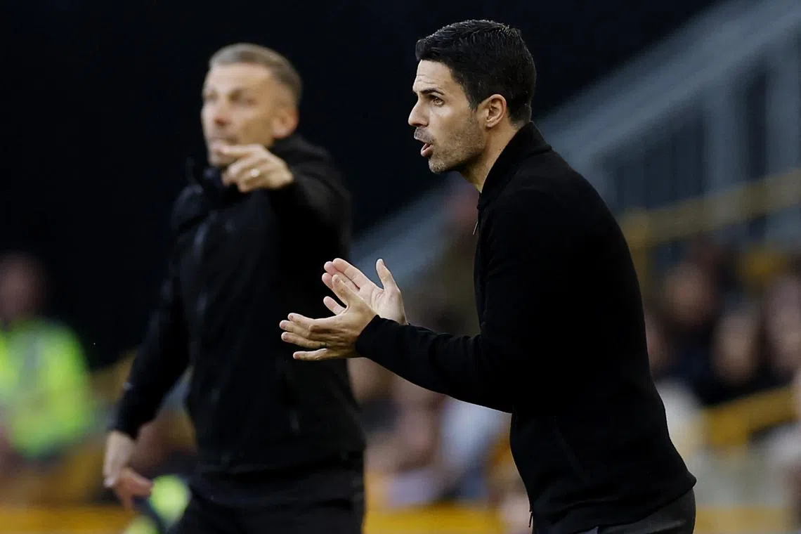 Soccer Football - Premier League - Wolverhampton Wanderers v Arsenal - Molineux Stadium, Wolverhampton, Britain - April 20, 2024  Arsenal manager Mikel Arteta reacts Action Images via Reuters/Jason Cairnduff