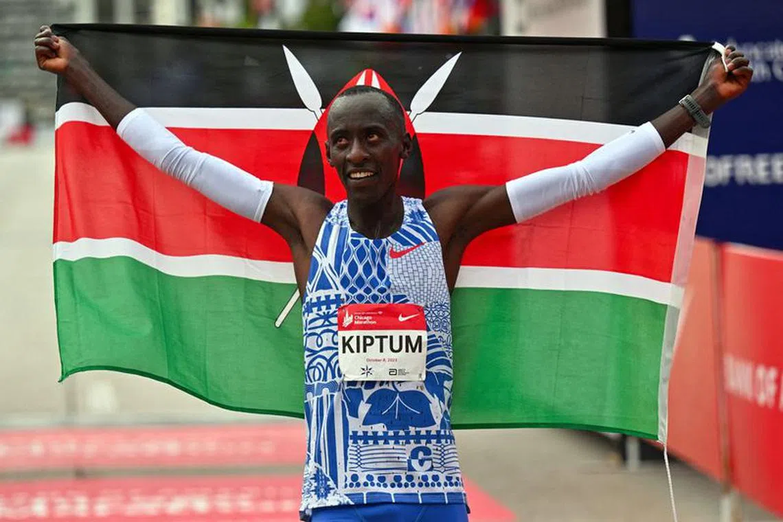 FILE PHOTO: Oct 8, 2023; Chicago, IL, USA;  Kelvin Kiptum of Kenya celebrates after setting a new world record time of 2:00:35 at the 2023 Chicago Marathon. Mandatory Credit: Jamie Sabau-USA TODAY Sports/File Photo
