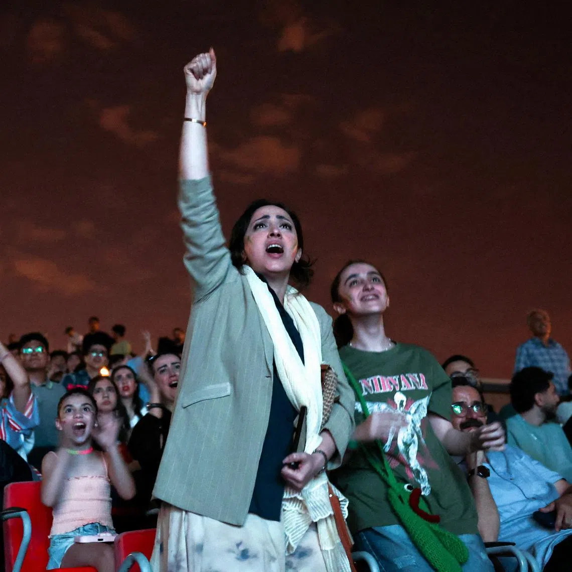 Soccer fans react as they watch the FIFA World Cup 2026 match between Belgium and Iran at a cinema in Tehran, Iran, June 21, 2026. Majid Asgaripour/WANA (West Asia News Agency) via REUTERS