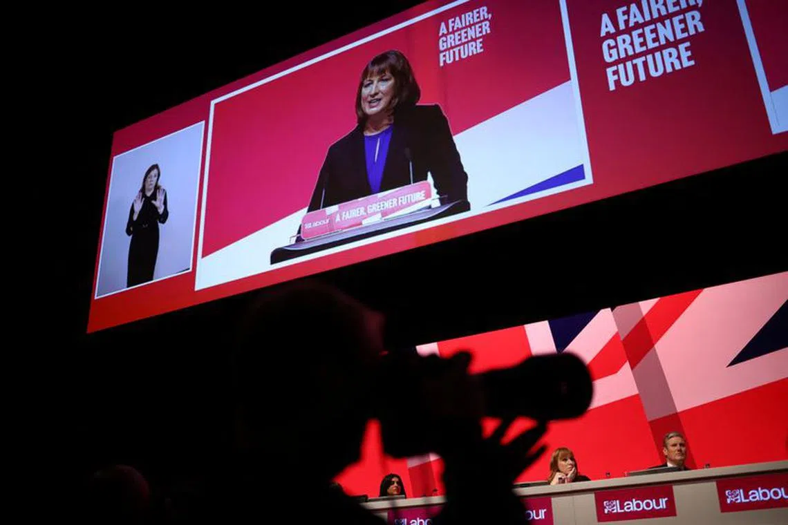 FILE PHOTO: Britain's Shadow Chancellor of the Exchequer Rachel Reeves appears on a screen during the Britain's Labour Party's annual conference in Liverpool, Britain, September 26, 2022. REUTERS/Henry Nicholls/file photo