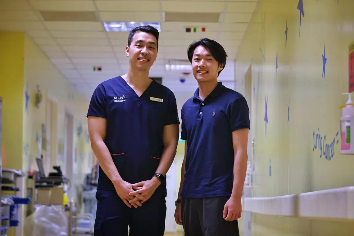 ST20230330_202370847512/jtblood03/Josiah Teo/Jason Quah

NUH’s Dr Shawn Lee (L) with patient Ryan Cho on March 30, 2023.