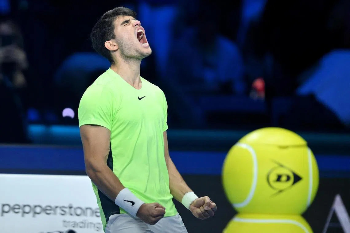 Carlos Alcaraz celebrates during the match against Daniil Medvedev at the ATP Finals.