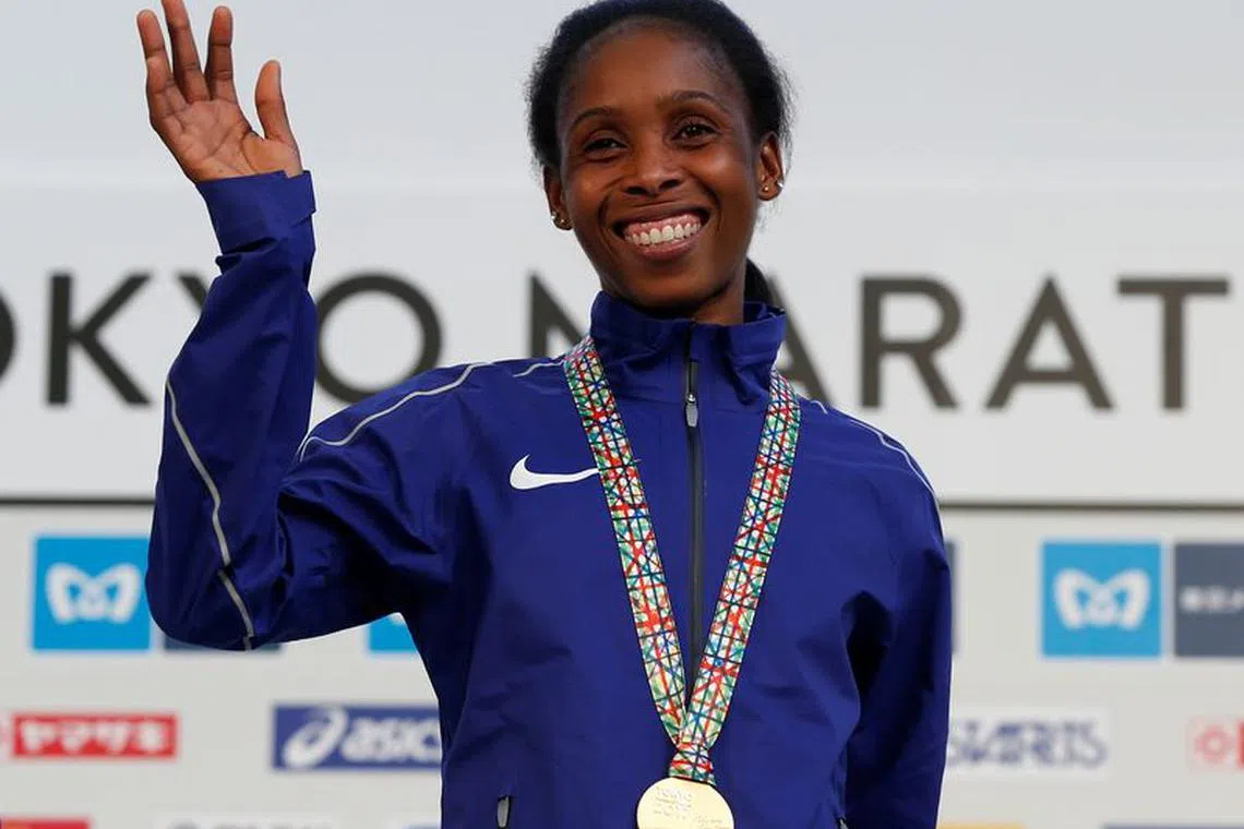 FILE PHOTO: Athletics - Tokyo Marathon 2017 - Tokyo, Japan - 26/02/17 -  Gold medalist Sarah Chepchirchir of Kenya poses at women's medal ceremony. REUTERS/Toru Hanai/File Photo