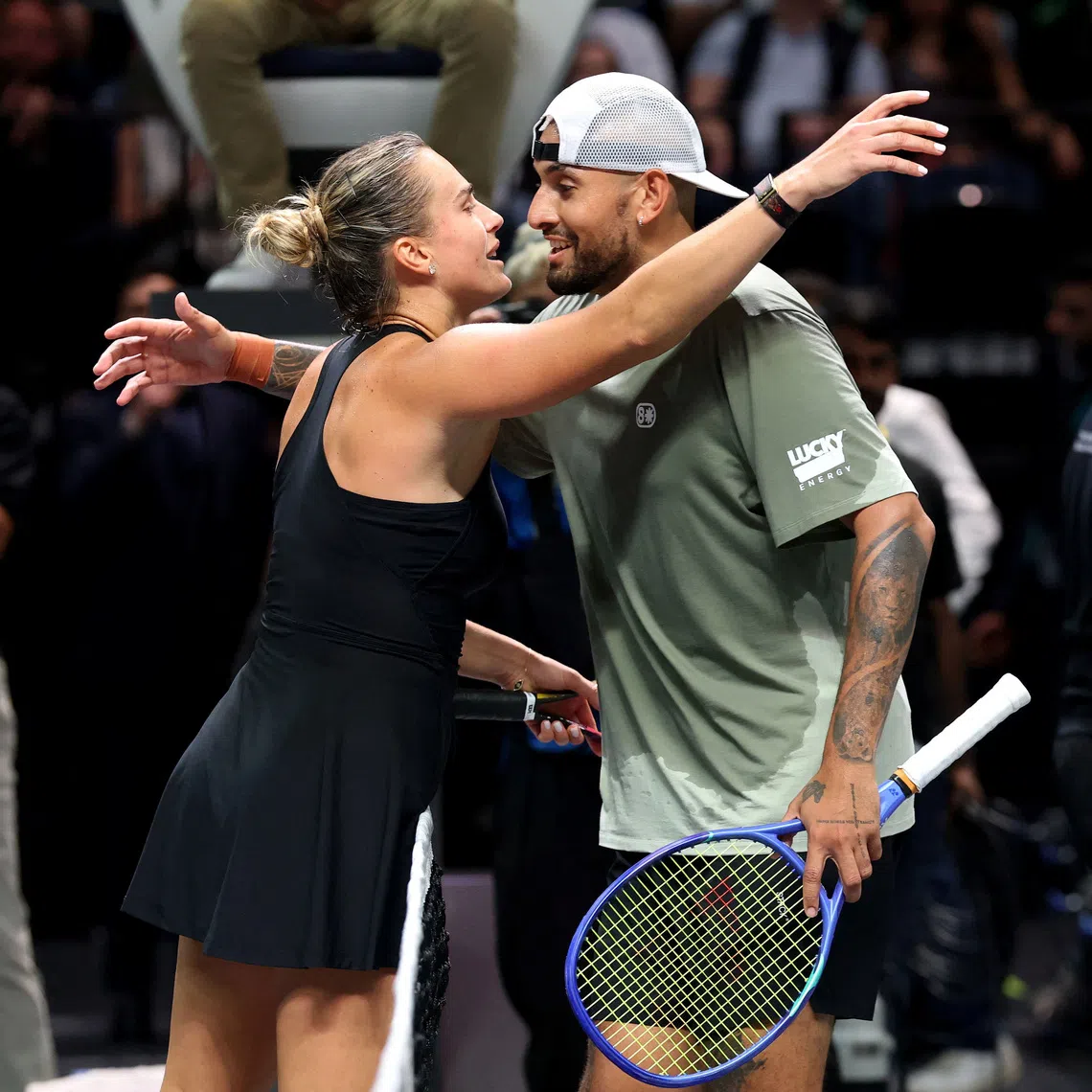 Tennis - 'Battle of the Sexes' - Nick Kyrgios v Aryna Sabalenka - Coca-Cola Arena, Dubai, United Arab Emirates - December 28, 2025 Australia's Nick Kyrgios and Belarus' Aryna Sabalenka after their match  Christopher Pike/Pool via REUTERS