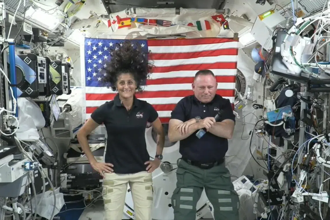 Butch Wilmore (right) and Suni Williams delivering a live press conference from the International Space Station on July 10.