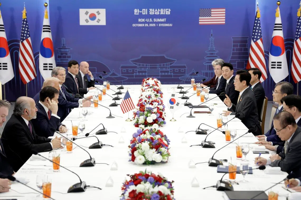 South Korean President Lee Jae Myung (fourth from right) and US President Donald Trump (fourth from left) hold talks at the Gyeongju National Museum in Gyeongju, South Korea, on Oct 29, 2025.
