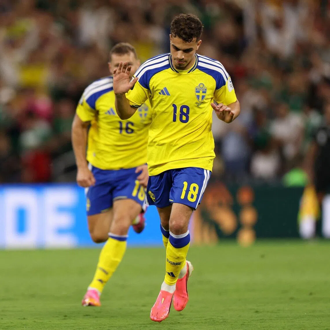 Sweden's midfielder Yasin Ayari celebrates very respectfully after scoring against Tunisia, which is the land his father came from. 