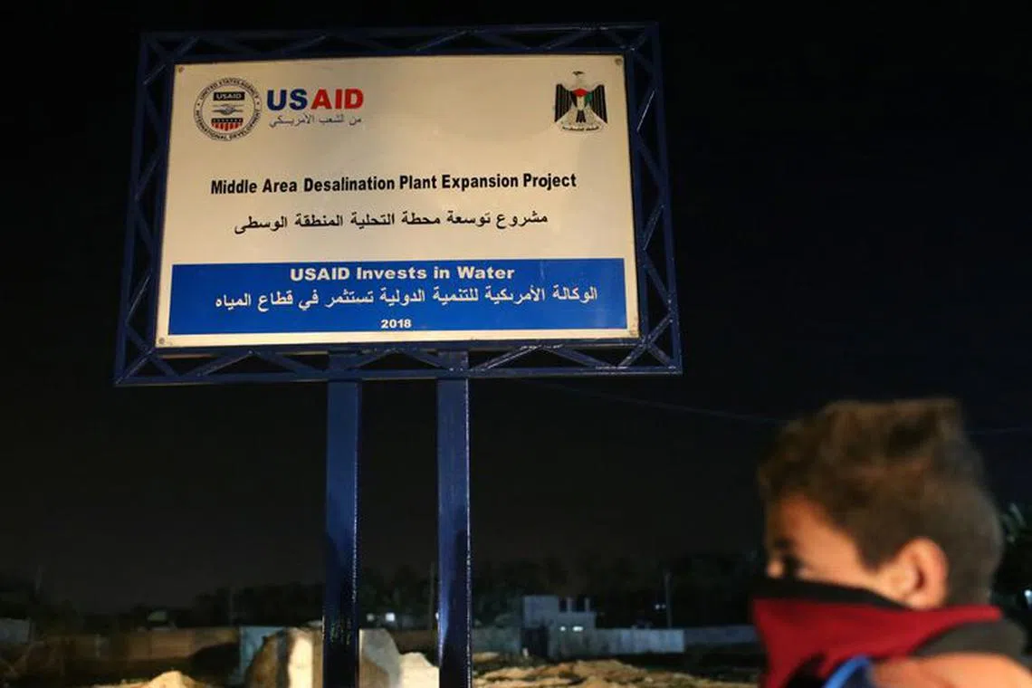 FILE PHOTO: A sign of a USAID project is seen in the central Gaza Strip  January 31, 2019. Picture taken January 31, 2019. REUTERS/Ibraheem Abu Mustafa/File Photo