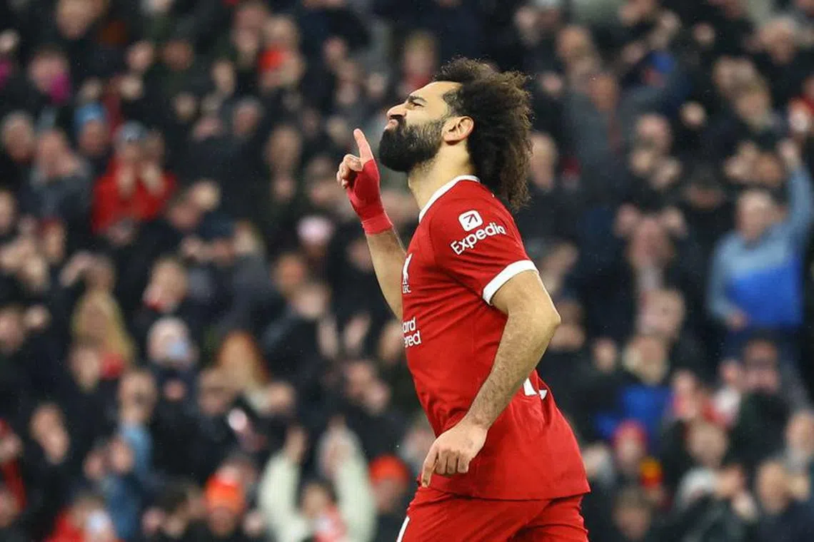 Soccer Football - Premier League - Liverpool v Newcastle United - Anfield, Liverpool, Britain - January 1, 2024 Liverpool's Mohamed Salah celebrates scoring their fourth goal REUTERS/Carl Recine