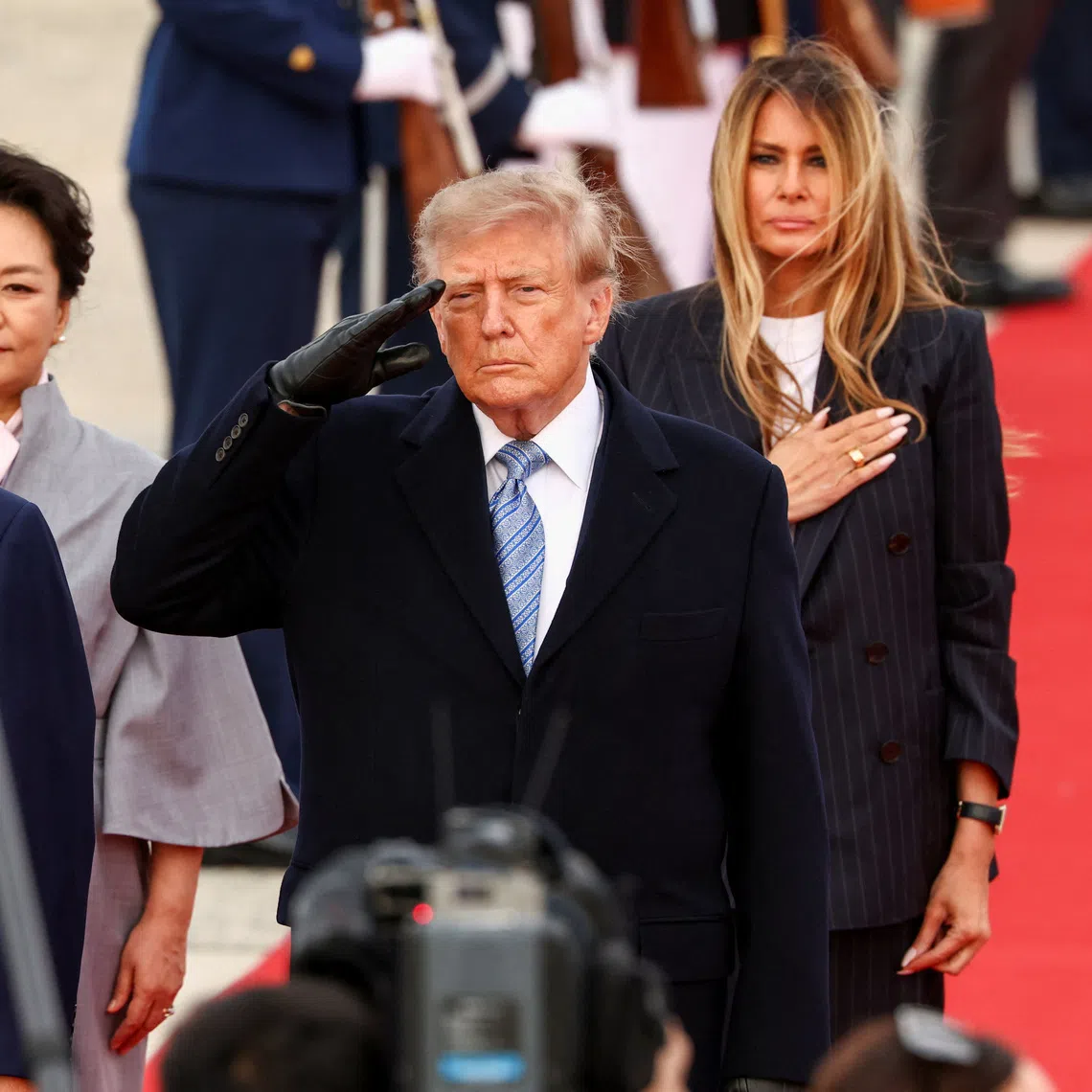 (From left) China’s President Xi Jinping, his wife Peng Liyuan, US President Donald Trump, and US first lady Melania Trump, at Joint Base Andrews, Maryland on Sept 23.