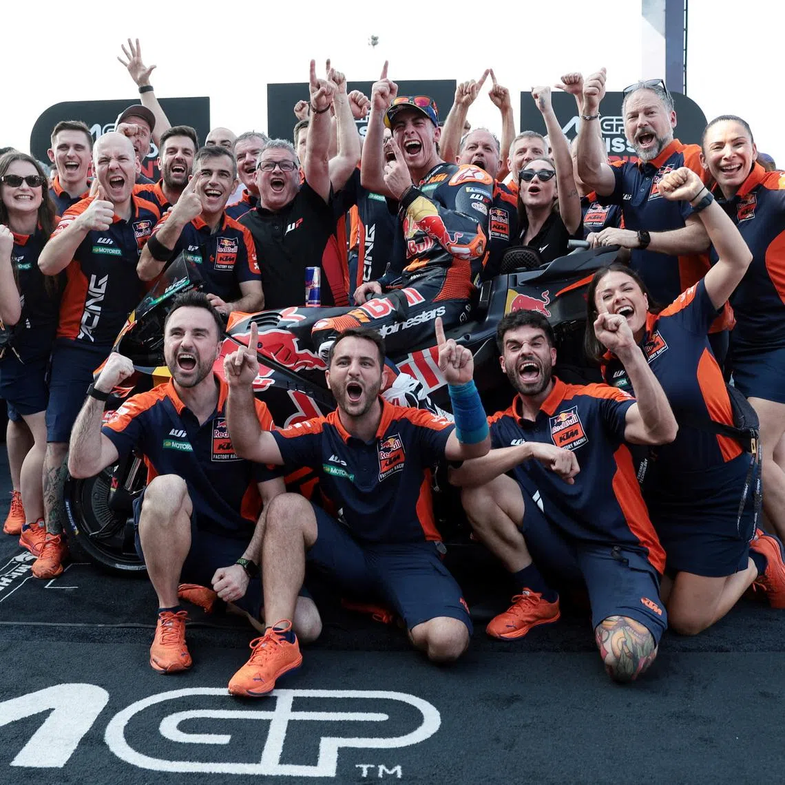 MotoGP - Thailand Grand Prix - Chang International Circuit, Buriram, Thailand - February 28, 2026 Red Bull KTM Factory Racing's Pedro Acosta celebrates with team after winning the MotoGP sprint race REUTERS/Chalinee Thirasupa