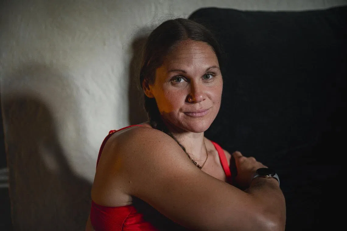 Christie Raleigh Crossley, who is heading to Paris as a first-time Paralympian, at her home in Toms River, New Jersey. The disabilities of the single mother of three, who survived two car crashes and a blood tumour that left her with a hole in her brain, are not so obvious to see like those of many competitors. It has made her successes controversial.