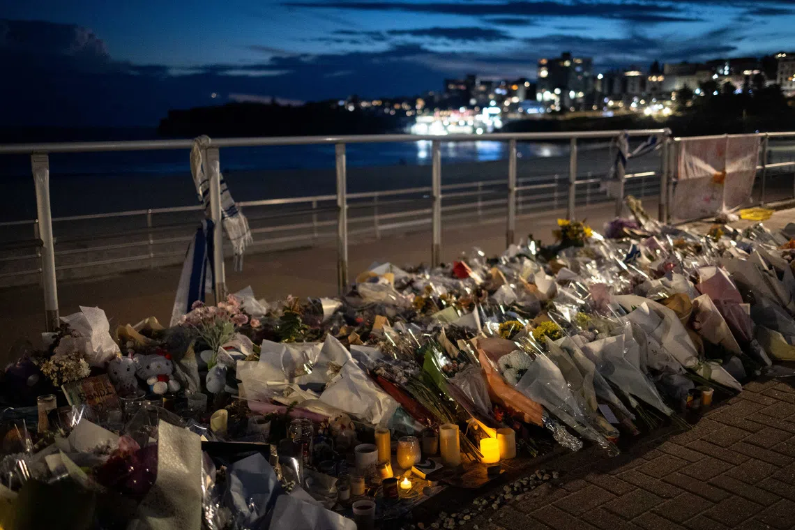 Flameless candles are lit for the victims of a mass shooting during a Jewish Hanukkah celebration at Bondi Beach on December 14, in Sydney, Australia, December 20, 2025. REUTERS/Eloisa Lopez