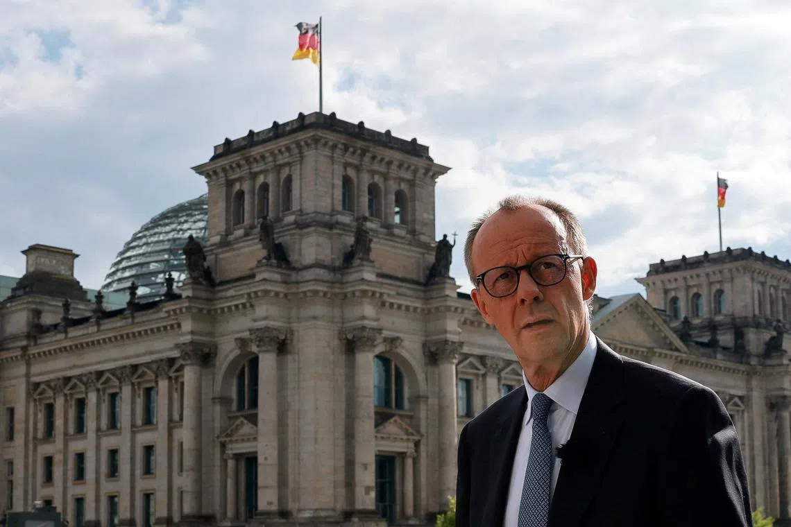FILE PHOTO: German Chancellor Friedrich Merz arrives to attend ARD summer interview, in Berlin, Germany, July 13, 2025. REUTERS/Fabrizio Bensch/File Photo