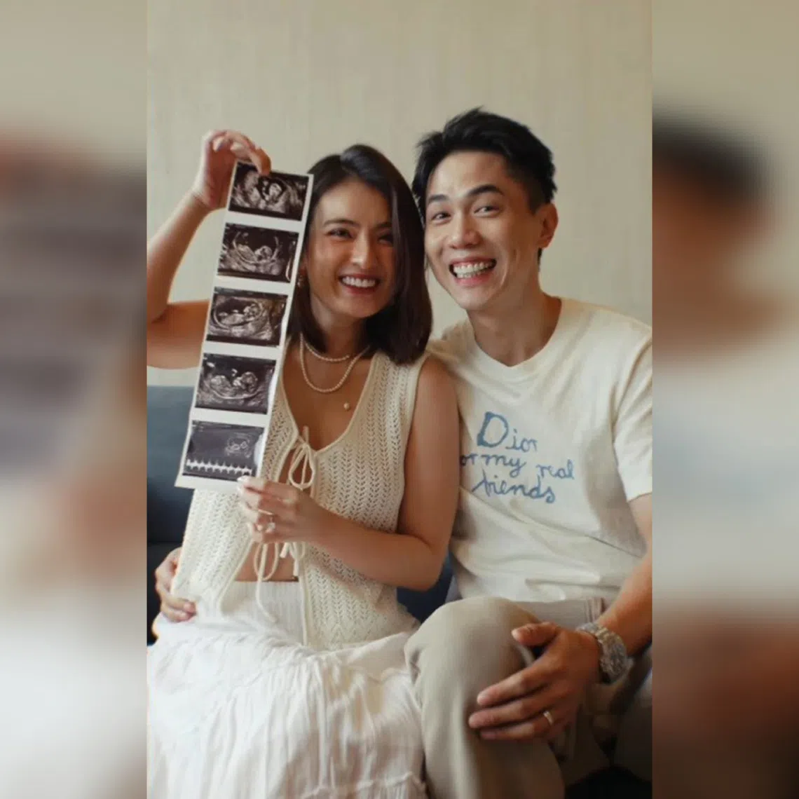 Singaporean actress Hong Ling (left) showing a series of ultrasound images with her husband, Singaporean actor Nick Teo (right).