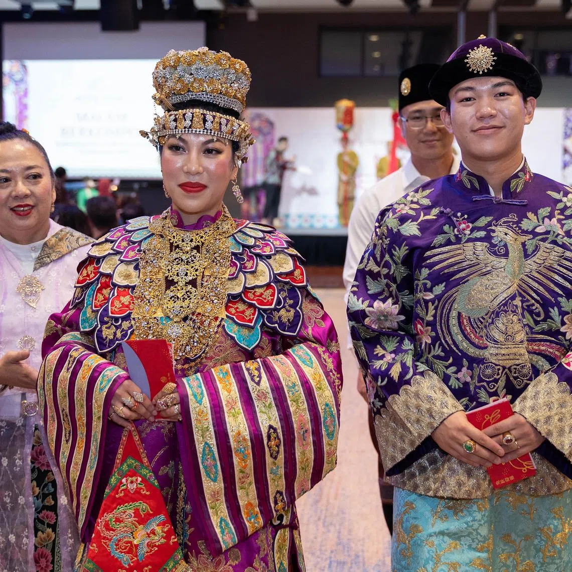 Ms Penelope Thoo and Mr Kean Wee celebrated their wedding at a dinner and dance marking the 113th anniversary of the Gunong Sayang Association.