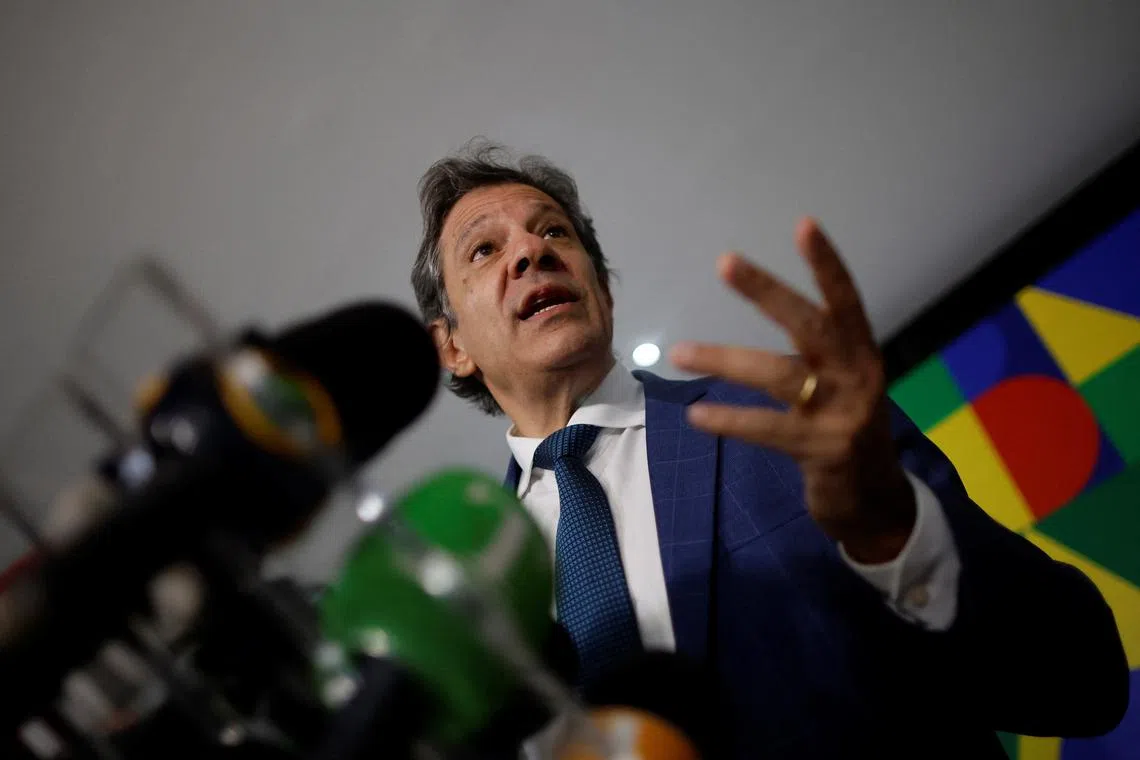 FILE PHOTO: Brazil's Finance Minister Fernando Haddad attends a press conference after meeting with Brazil's President Luiz Inacio Lula da Silva at the Planalto Palace in Brasilia, Brazil January 29, 2025. REUTERS/Adriano Machado/File Photo