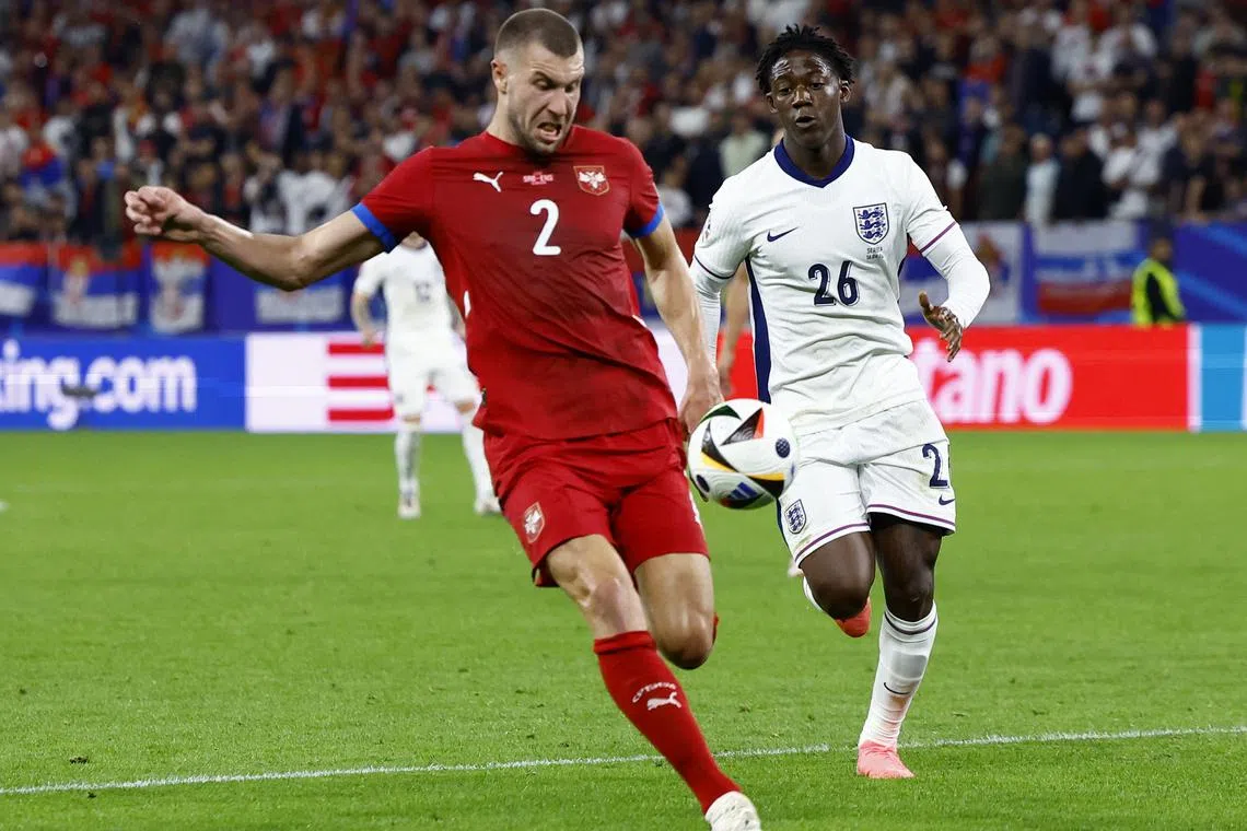 FILE PHOTO: Soccer Football - Euro 2024 - Group C - Serbia v England - Arena AufSchalke, Gelsenkirchen, Germany - June 16, 2024 Serbia's Strahinja Pavlovic in action with England's Kobbie Mainoo REUTERS/Piroschka Van De Wouw/FIle Photo