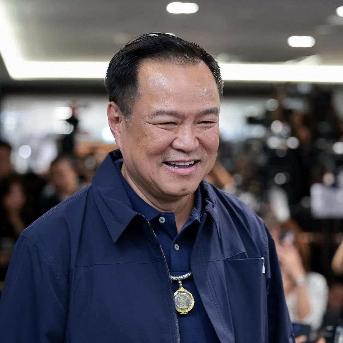 Thailand's caretaker Prime Minister Anutin Charnvirakul, Bhumjaithai Party leader, arriving for a press conference at the party headquarters in Bangkok on Feb 8.