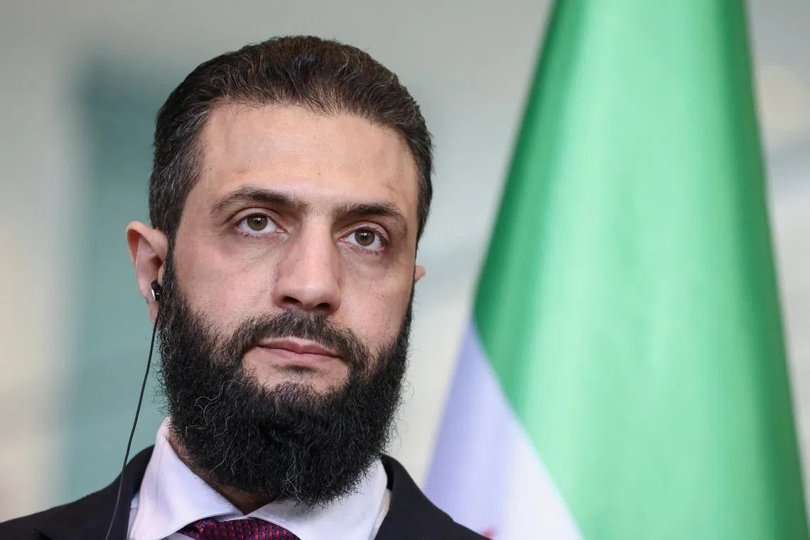 Syrian President Ahmed al-Sharaa speaks as he holds a press conference with German Chancellor Friedrich Merz at the Chancellery, in Berlin, Germany, March 30, 2026. REUTERS/Nadja Wohlleben/File Photo
