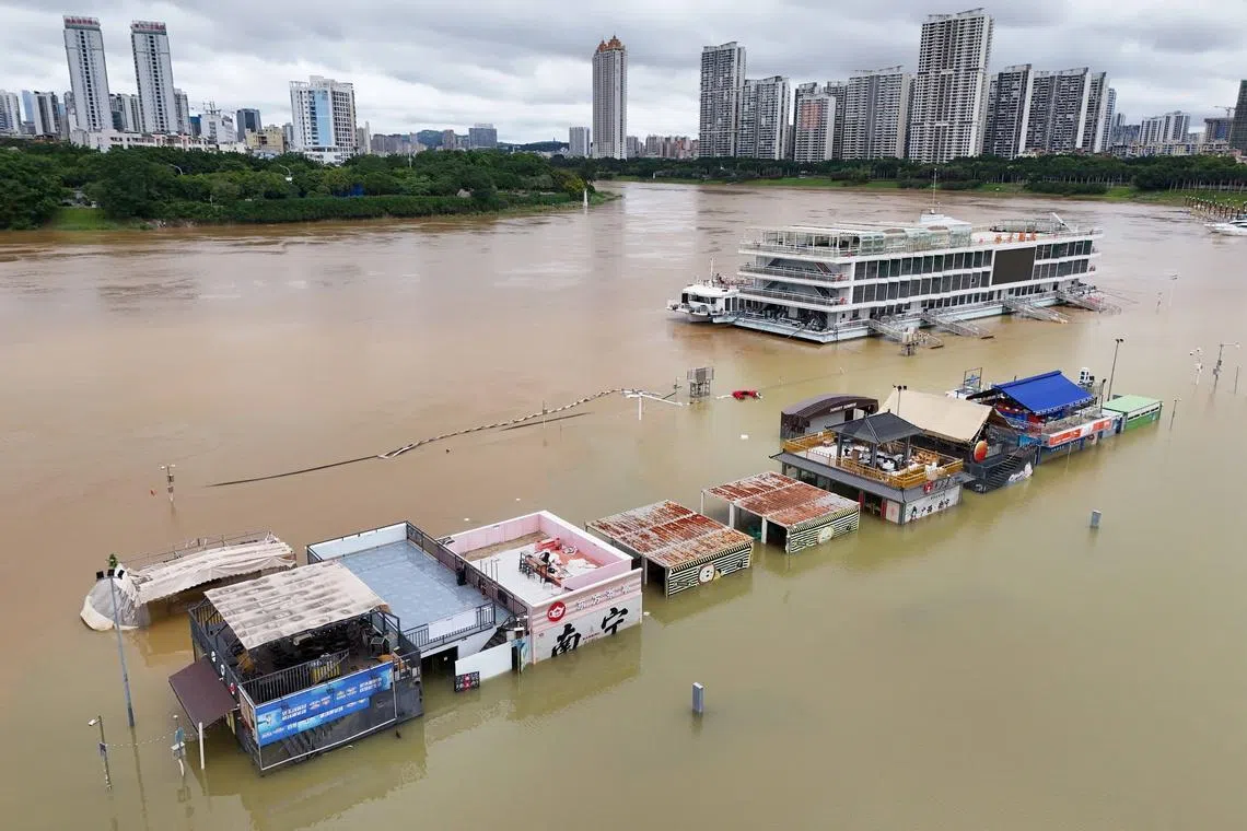 A riverside park inundated by the surging flood brought by Typhoon Maysak in Nanning in southern China’s Guangxi Zhuang Autonomous Region, on July 7.