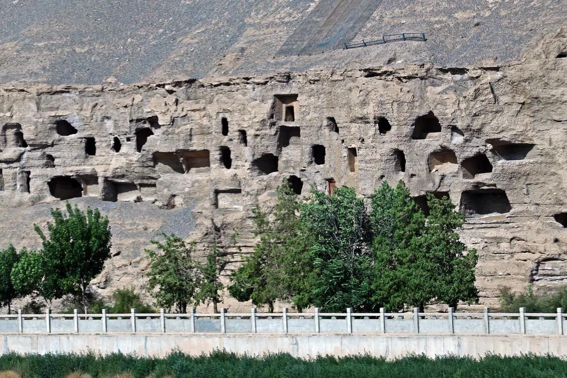 The Mogao Caves is carved into the cliffs on the edge of the Gobi Desert.