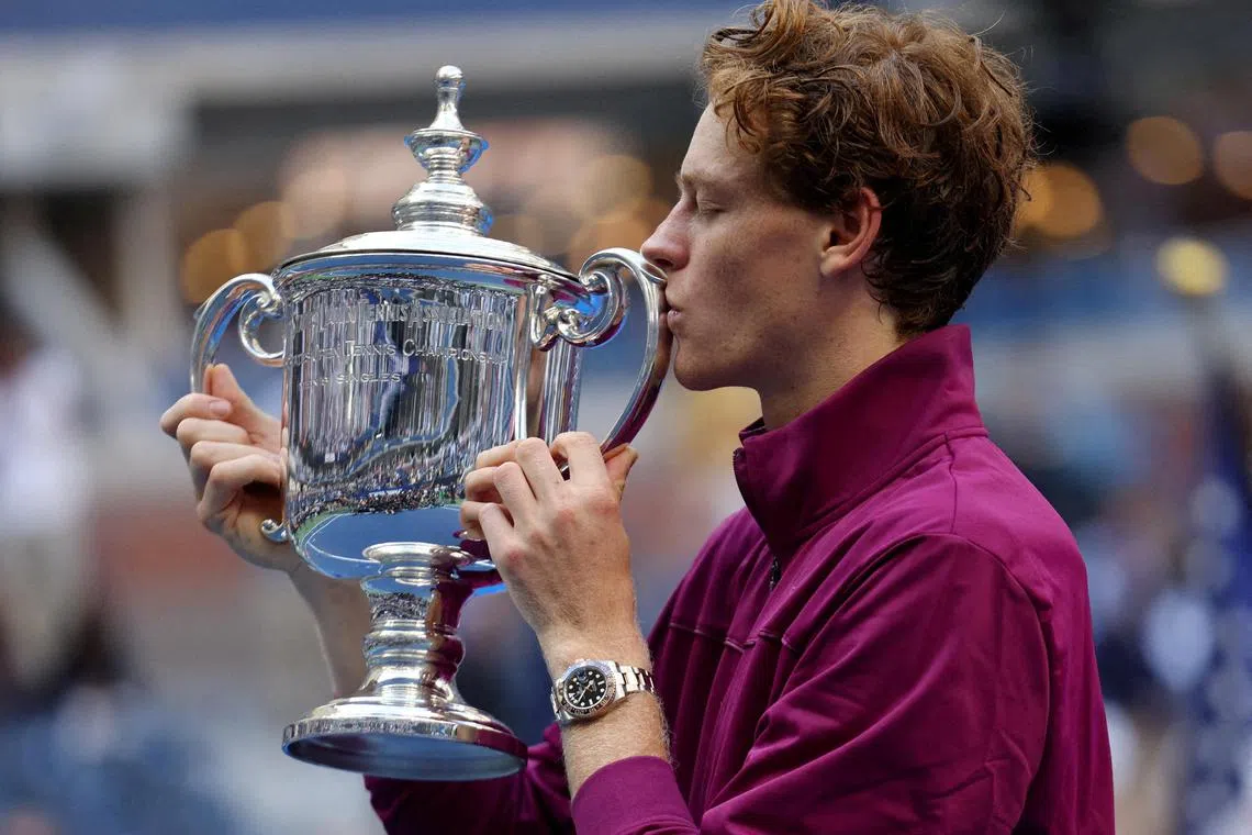 Italy's Jannik Sinner with the US Open trophy, his second Grand Slam title, after winning the final against American Taylor Fritz.