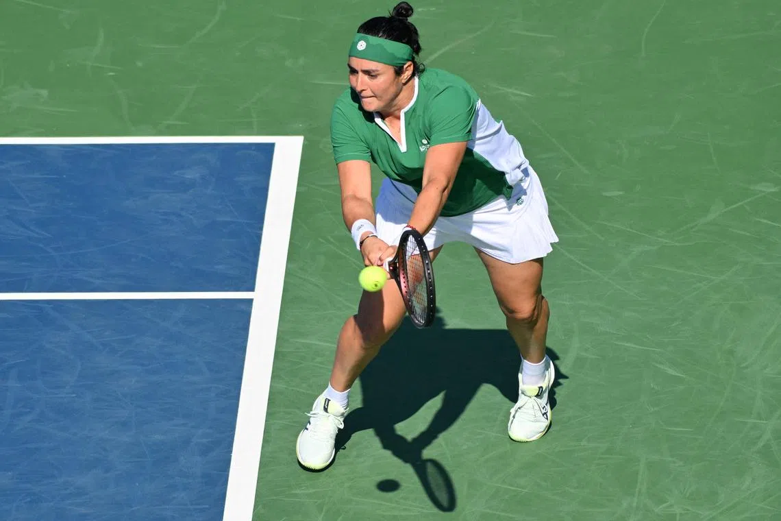 FILE PHOTO: Aug 7, 2024; Toronto, Ontario, Canada;   Ons Jabeur (TUN) plays a shot against Naomi Osaka (JPN, not shown) in second round play at Sobeys Stadium. Mandatory Credit: Dan Hamilton-USA TODAY Sports/File Photo