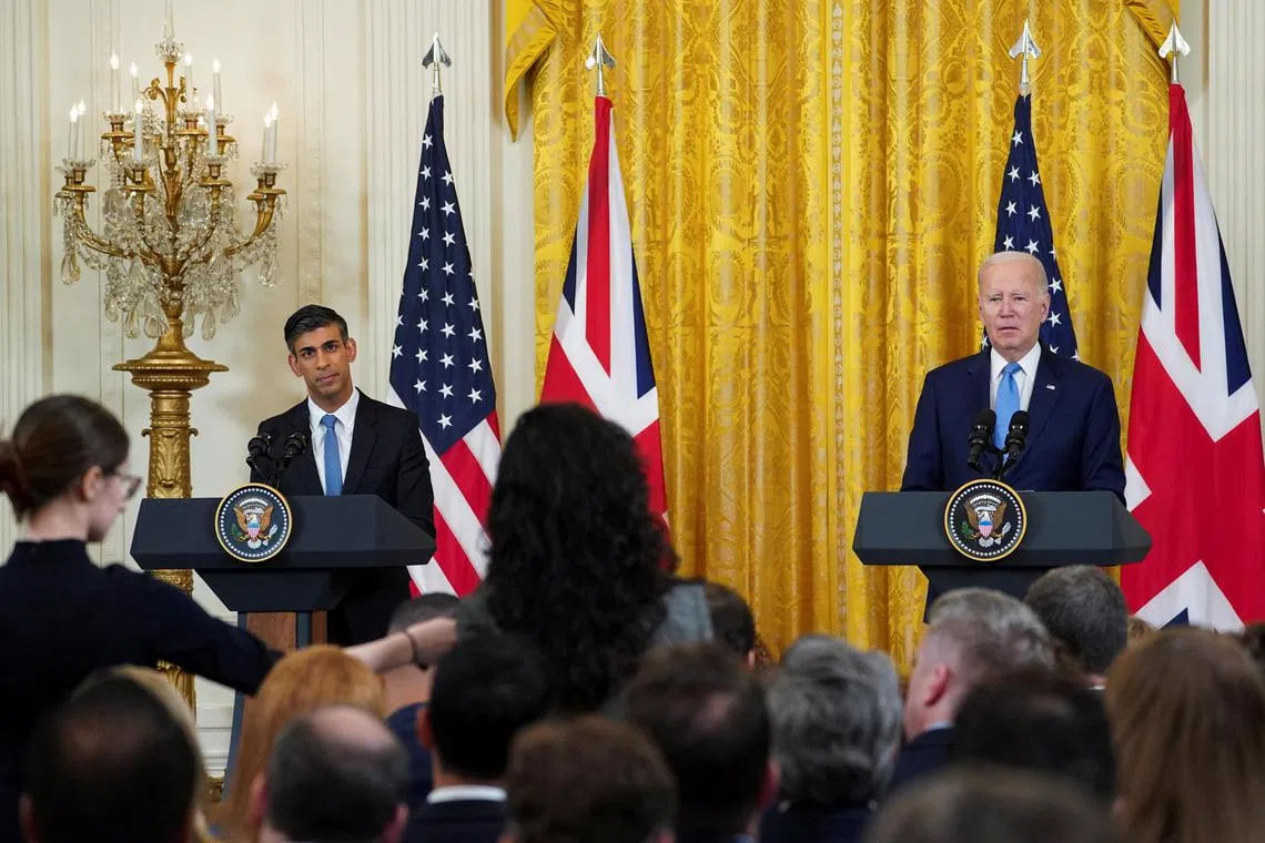 US President Joe Biden holds a joint press conference with British Prime Minister Rishi Sunak (left) at the White House.